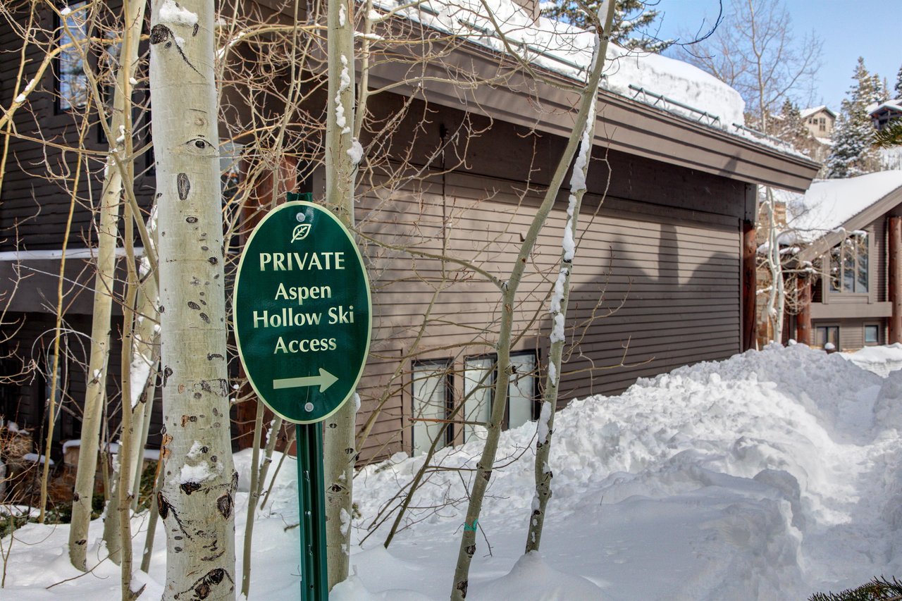 The exterior of Aspen Hollow 6 with a skiout trail to Deer Valley Resort.