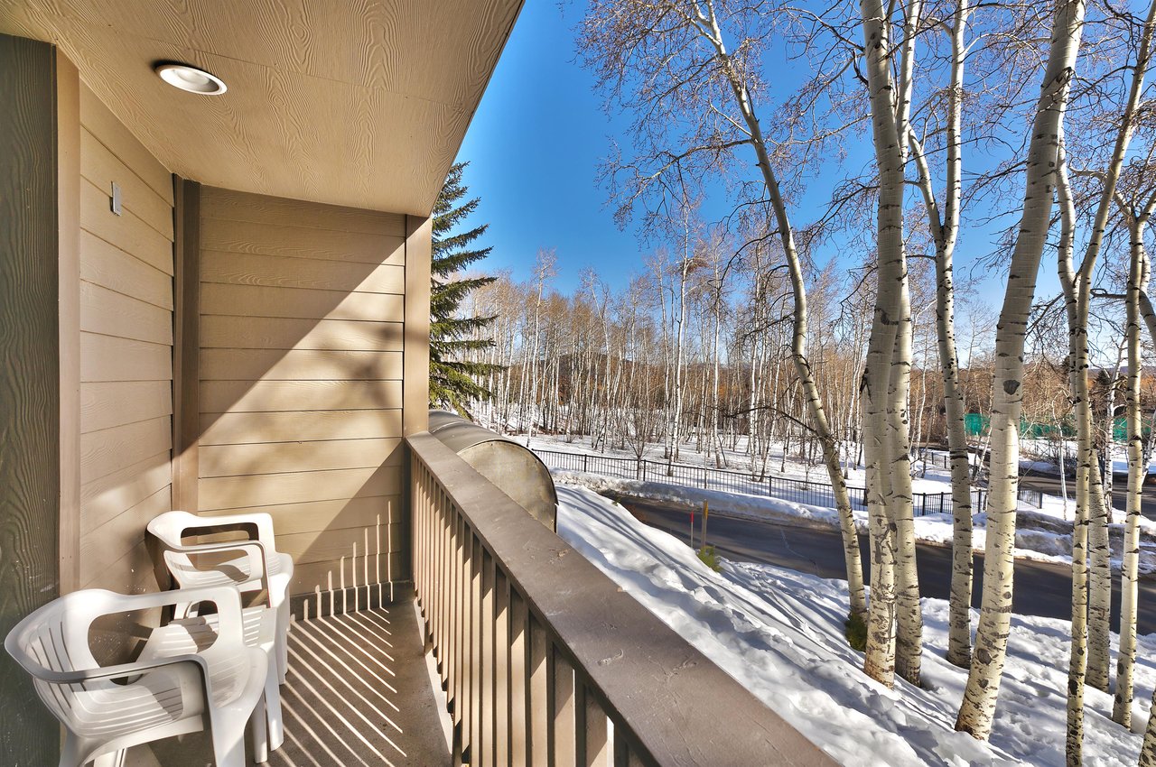 The private patio looks over a grove of Aspen trees