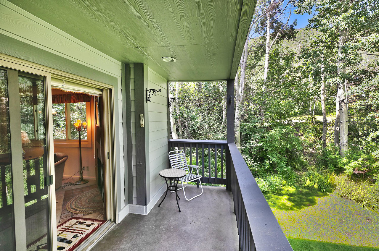Relax on the private patio overlooking aspen groves