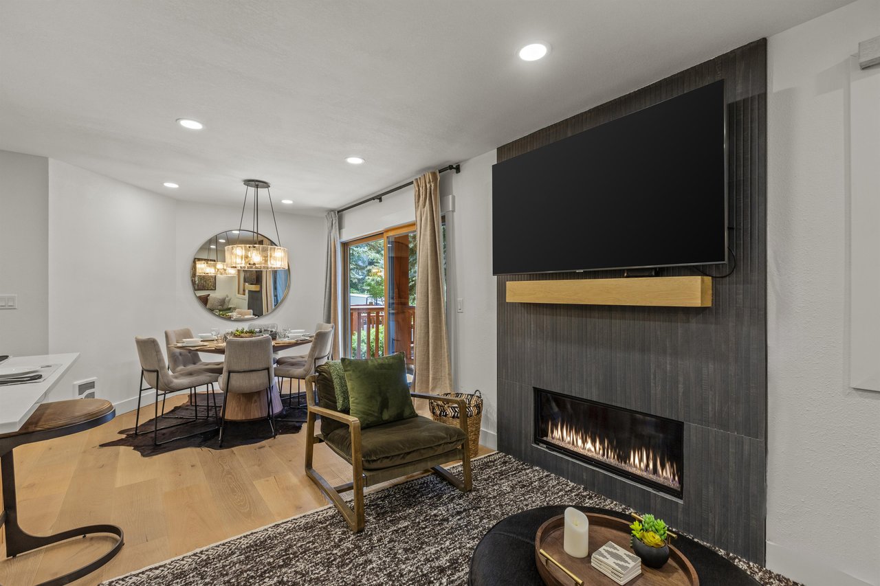The living room offers a gas burning fireplace and large flat screen TV.