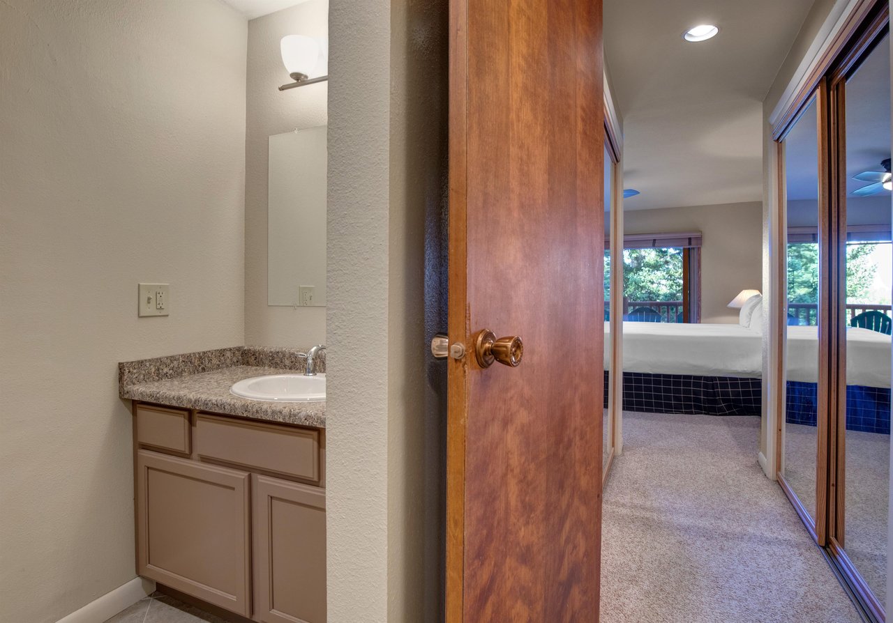 The en suite bathroom and one of two sinks.