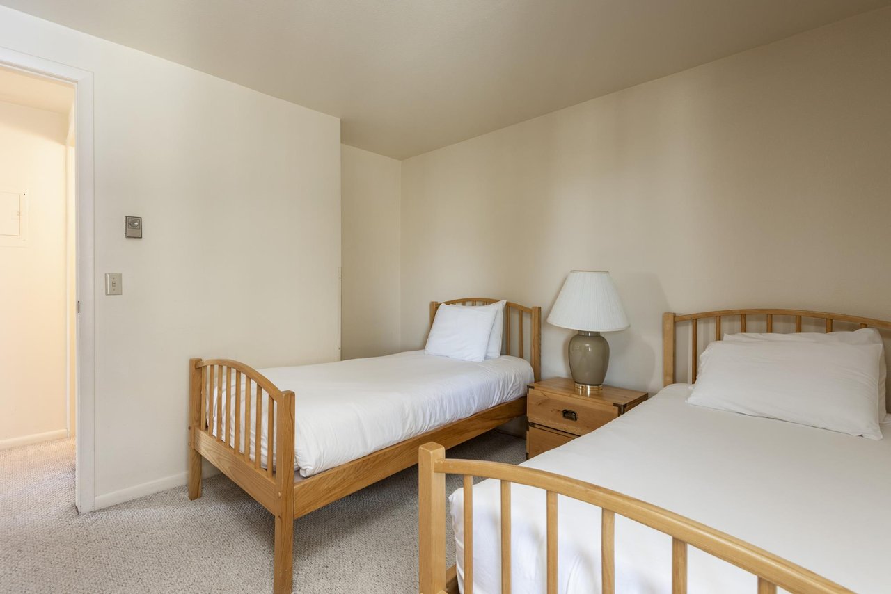 The guest bedroom with two twin beds.