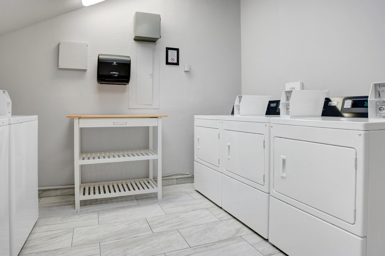 Common laundry room located on the second floor. Machines accept both coin payment and credit card via smartphone app