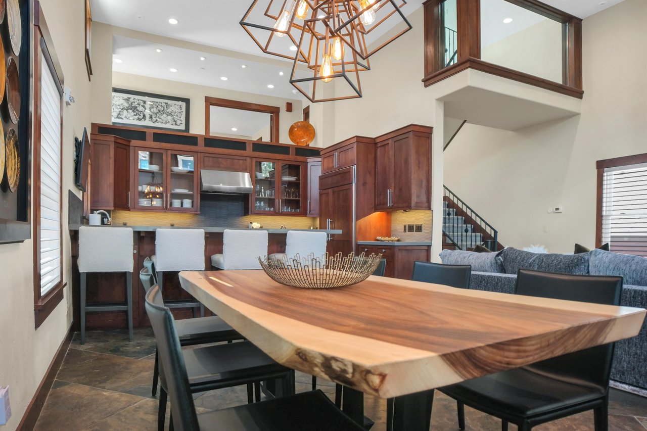 Vacation rental home offers dining table with open kitchen