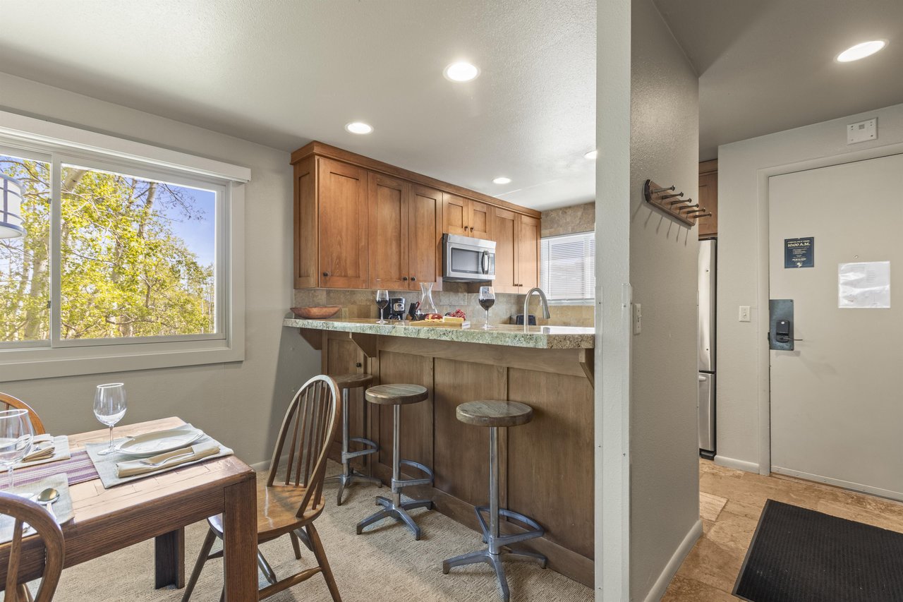 The breakfast bar offers seating for 3 guests.