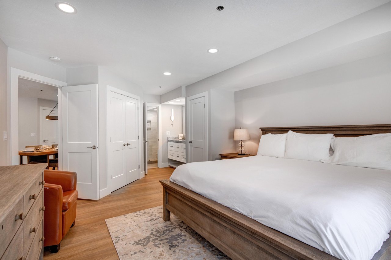 The main suite offers a king size bed and well appointed furniture.