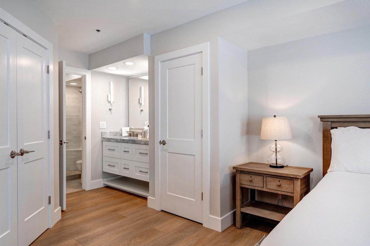 The en suite bathroom is bright and inviting.
