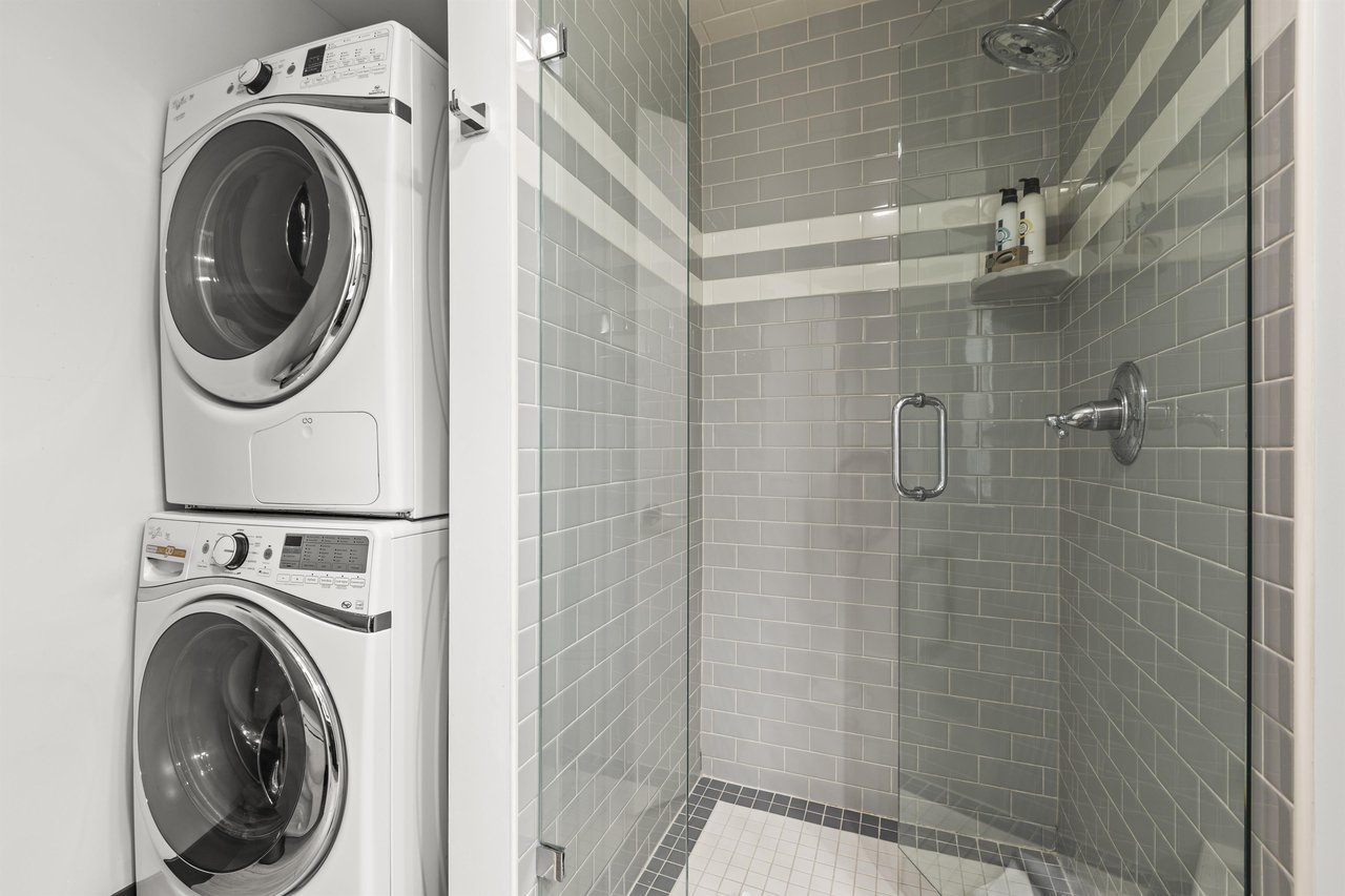The shared bathroom has a walkin shower and a private washer and dryer.