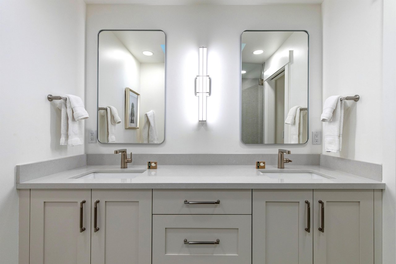 The en suite bathroom with two sink vanity.