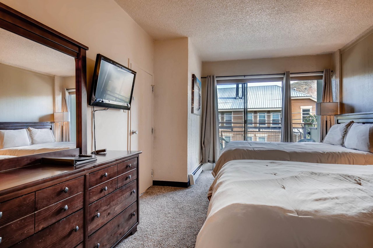 This hotel style condo offers two comfortable queen size beds.