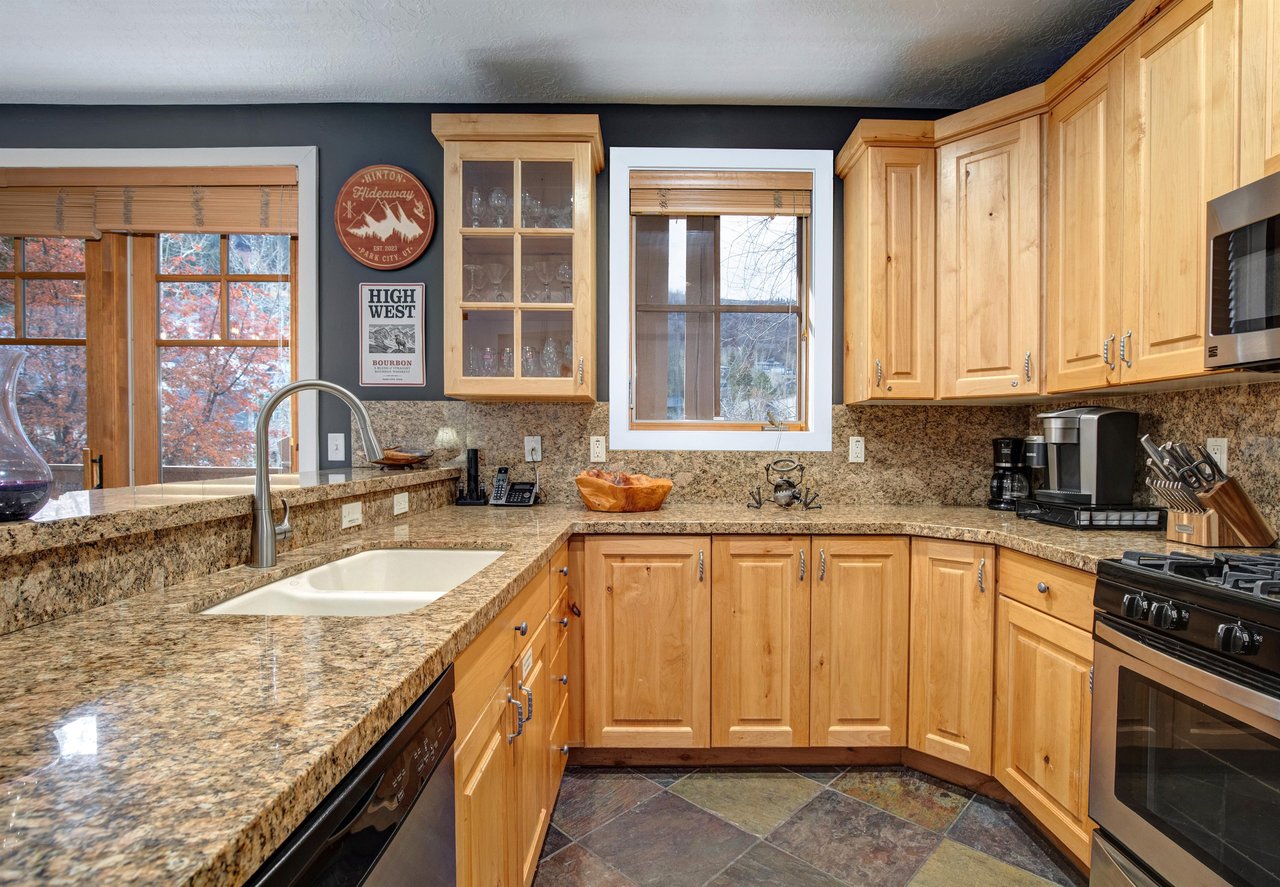 Your fully equipped kitchen features granite countertops, quality appliances, and everything you need to prepare meals during your stay.