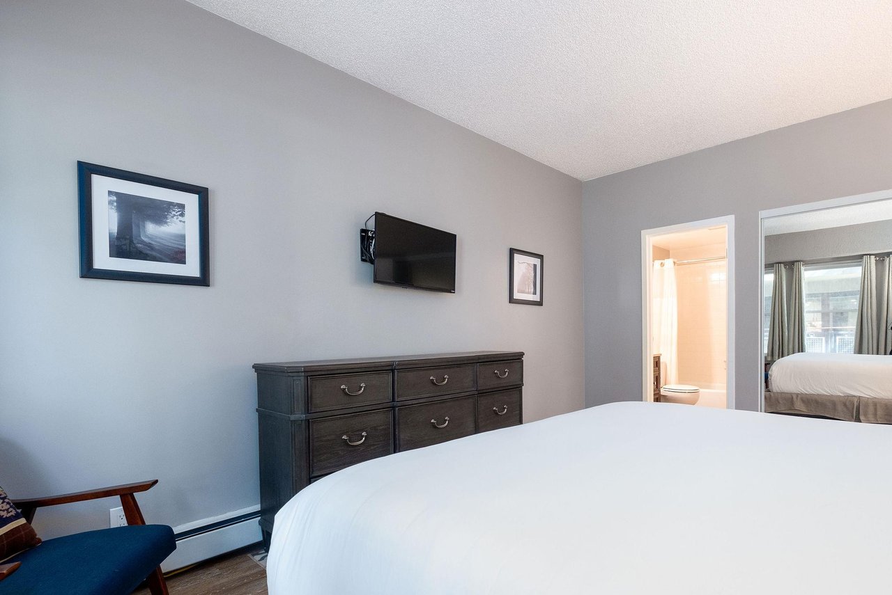Lush king bed in the main bedroom