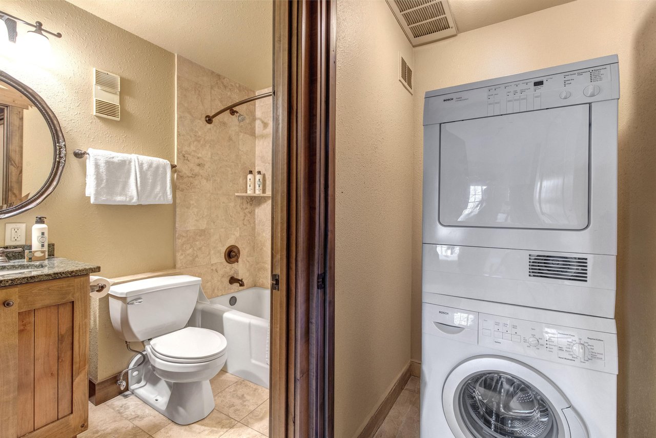 Enjoy a full bathroom with showertub combo, plus inunit washer and dryer for effortless stays.