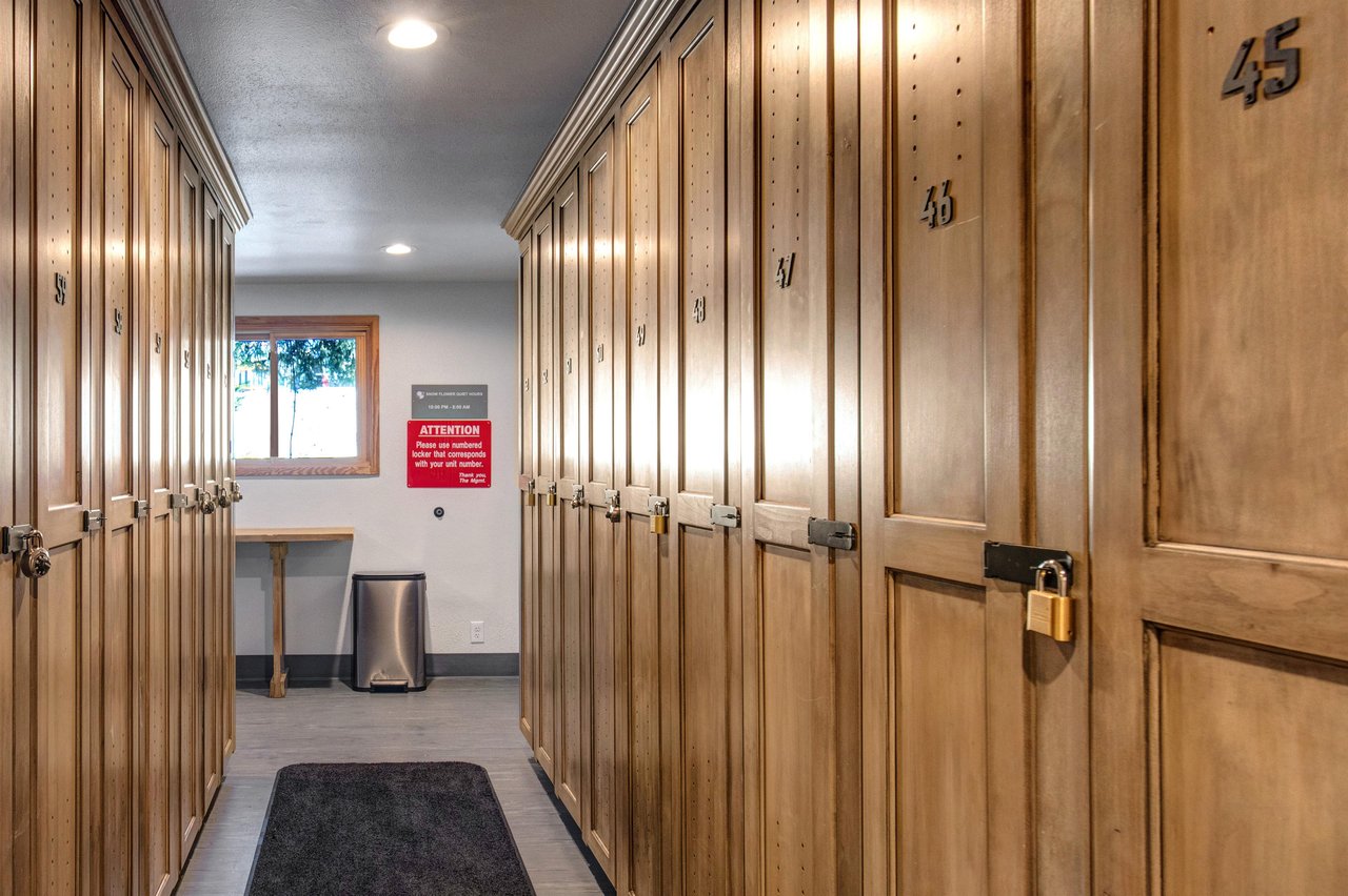 Secure your gear in wooden lockers for peace of mind during your stay.