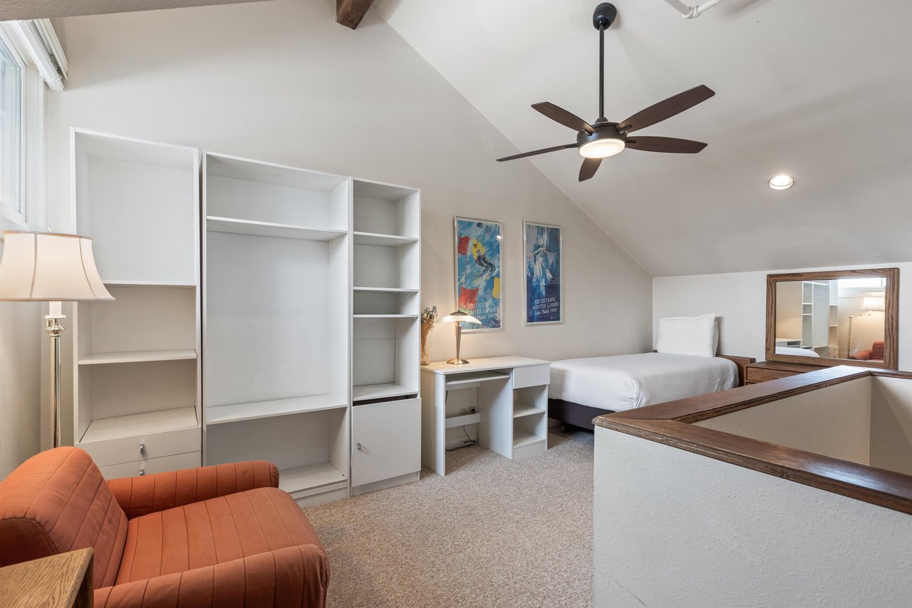 Premier Snow Flower Condominium 130s additional roomloft with extra seating and twin bed.