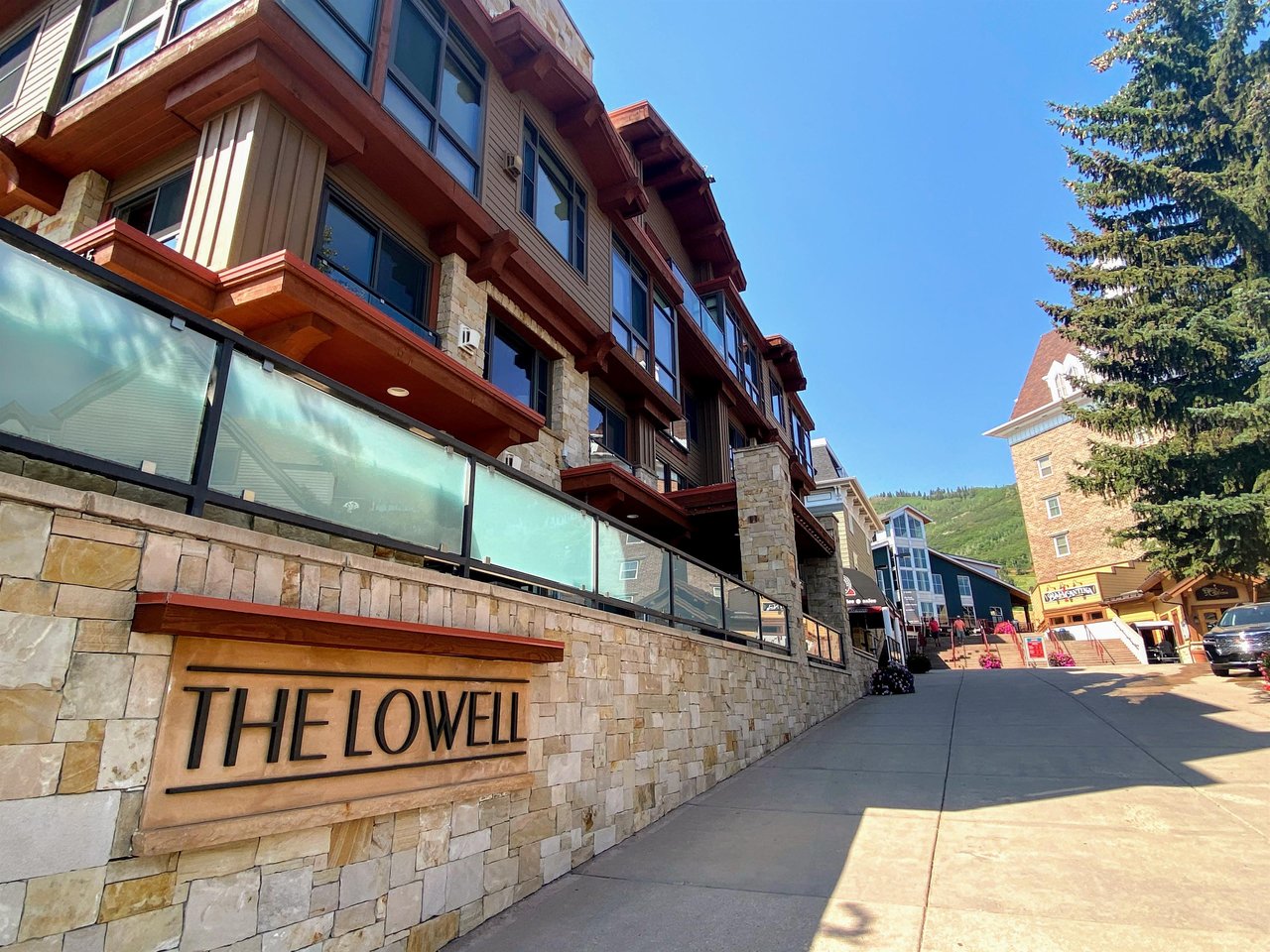 The Lowell Plaza flagstone entrance next to the Park City Mountain Resort plazabase area.
