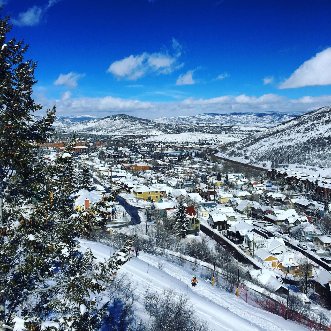 Views from Park City Mountains Town Lift of the snowy Historic District and surrounding mountains in Park City, Utah.