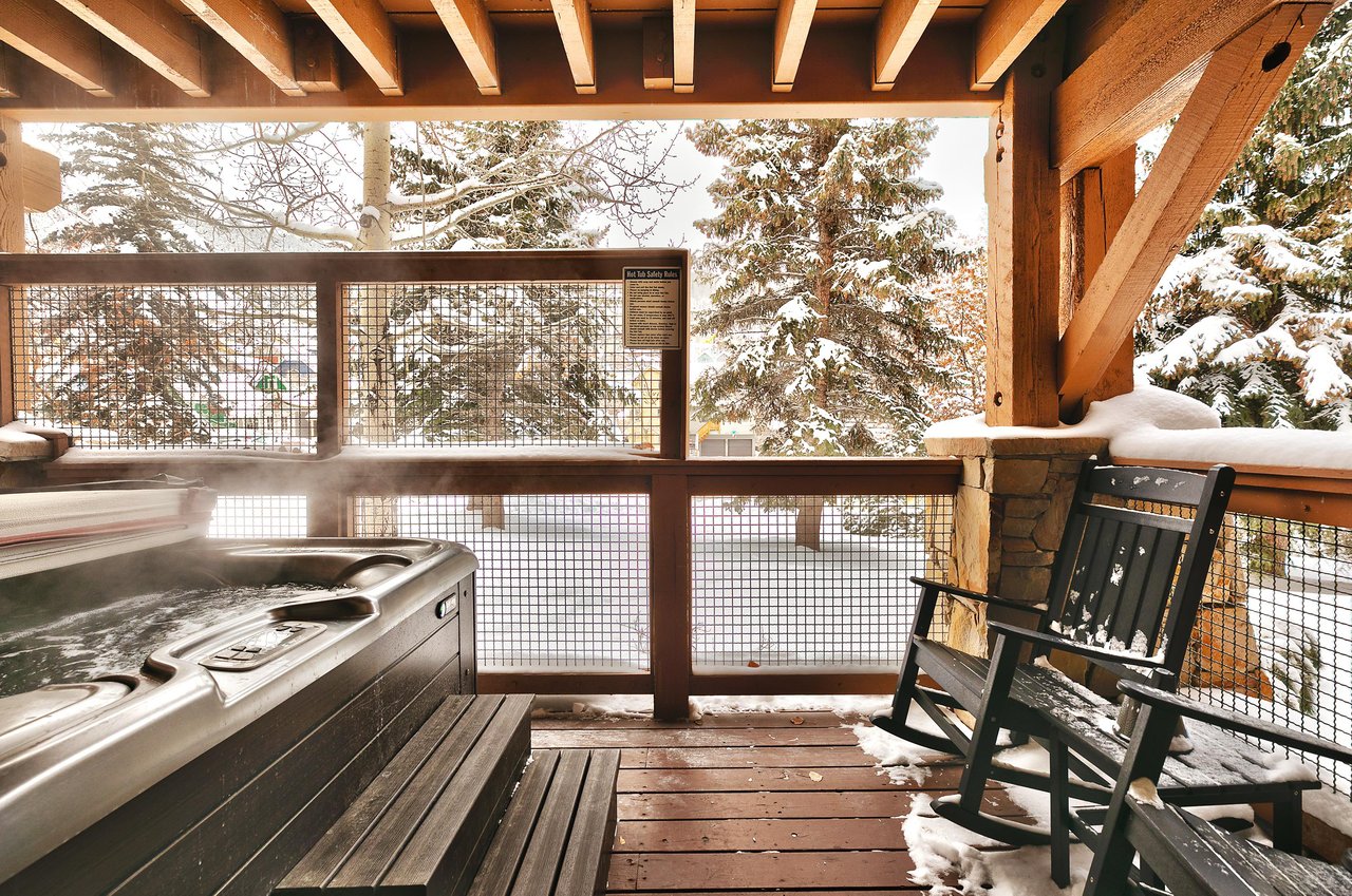 Enjoy your own private hot tub on the deck overlooking the mountain