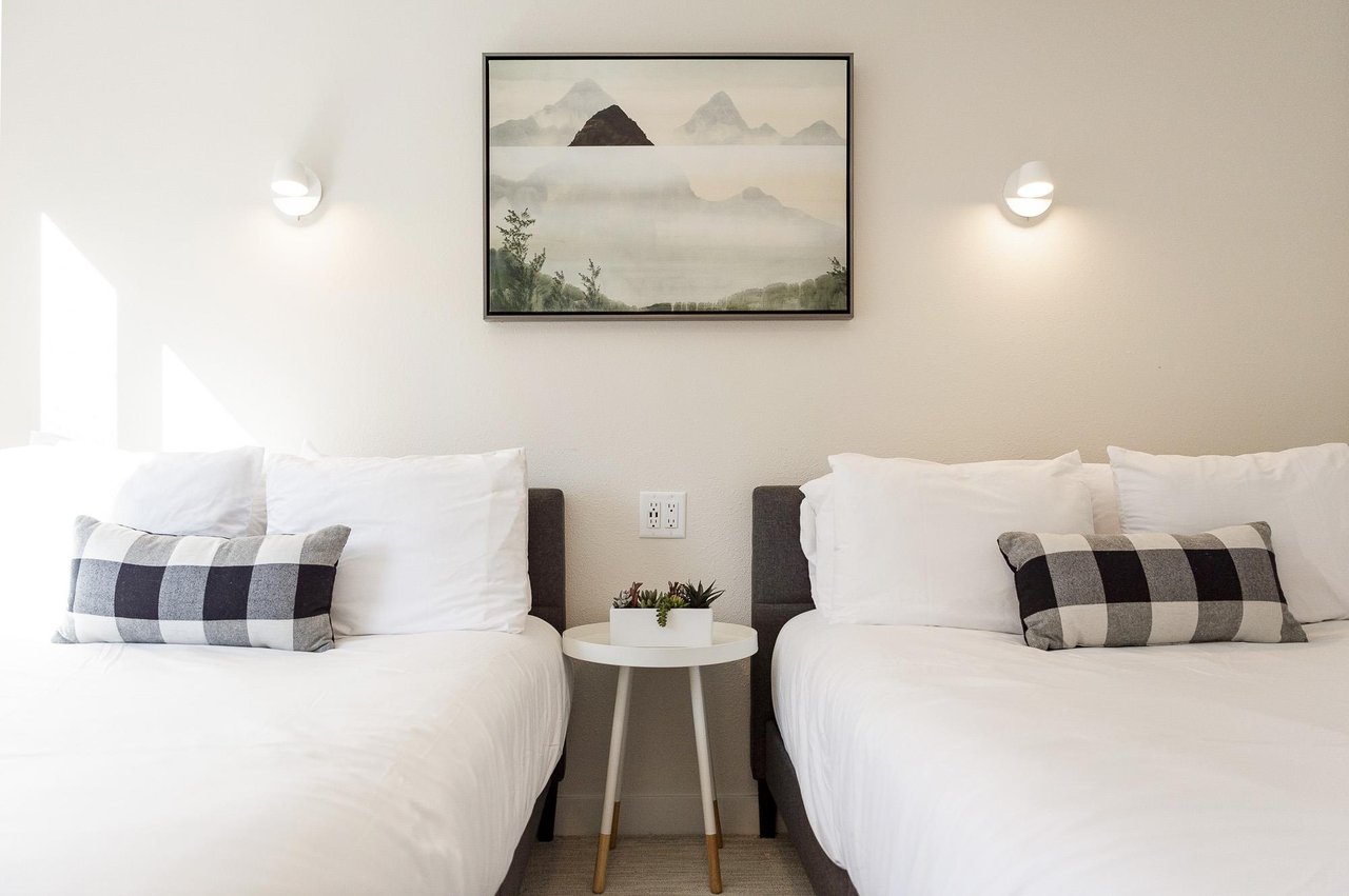 Two double beds in the guest bedroom