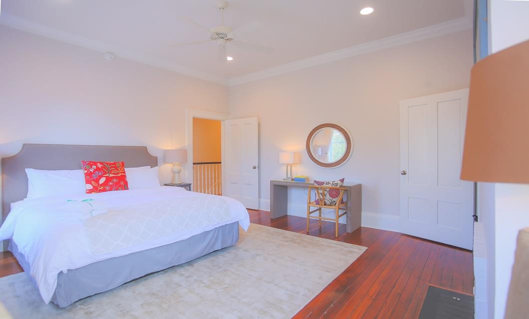 Go on up the stairs to the first bedroom. Have sweet dreams in this king size bed.