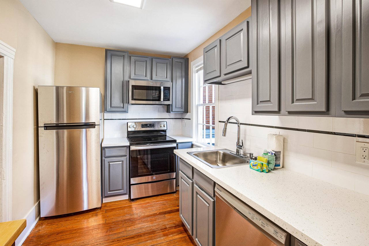Just off of the living space, youll find the completely renovated kitchen with stainless steel appliances.