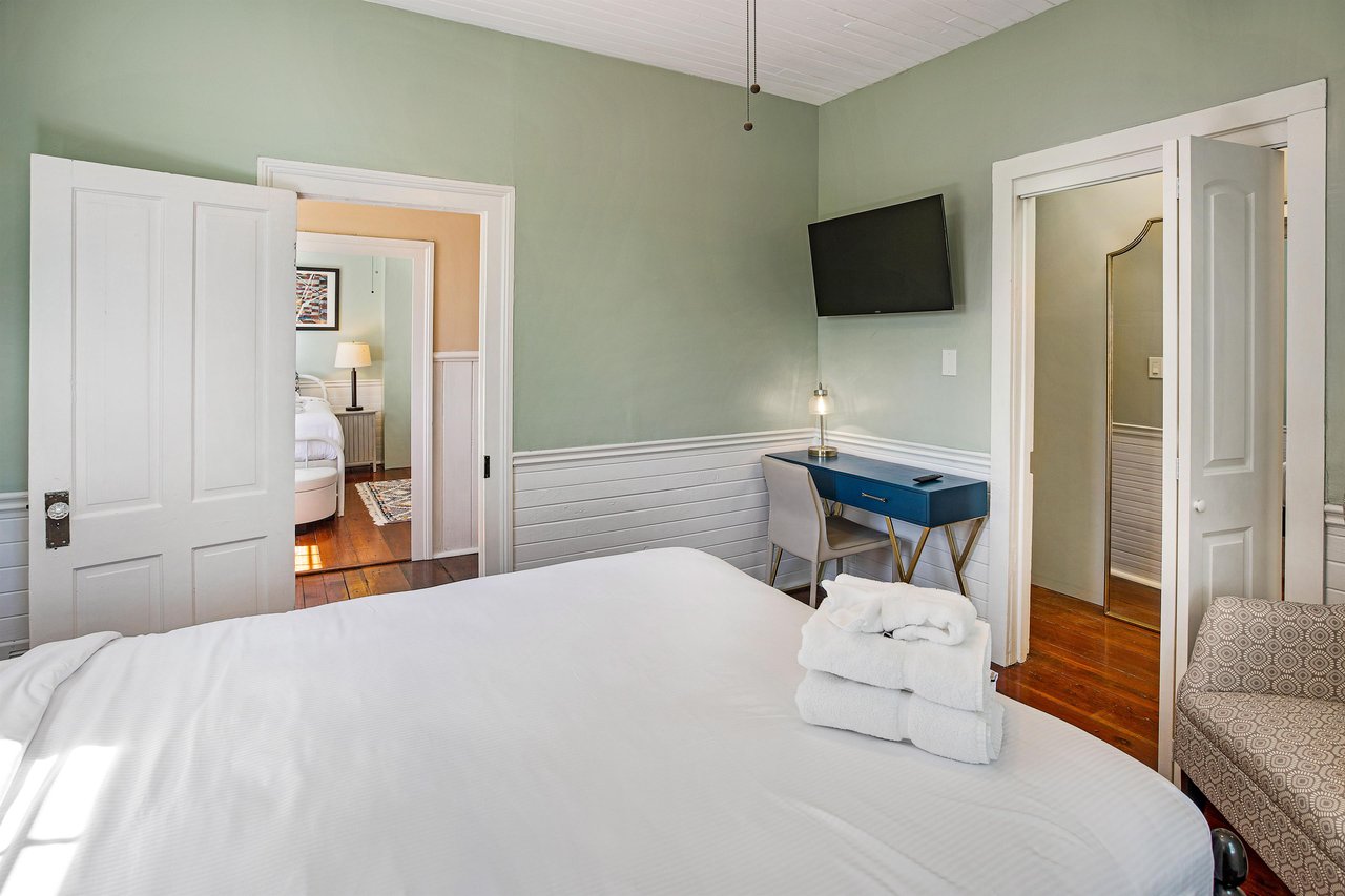 The walkin closet features a large mirror, which is ideal for the perfect mirror selfie before a night on the town