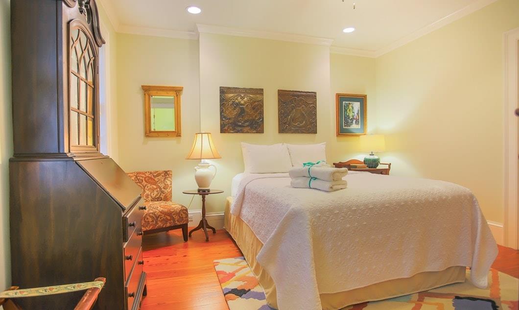 This beautiful bedroom looks out over historic Tattnall Street.