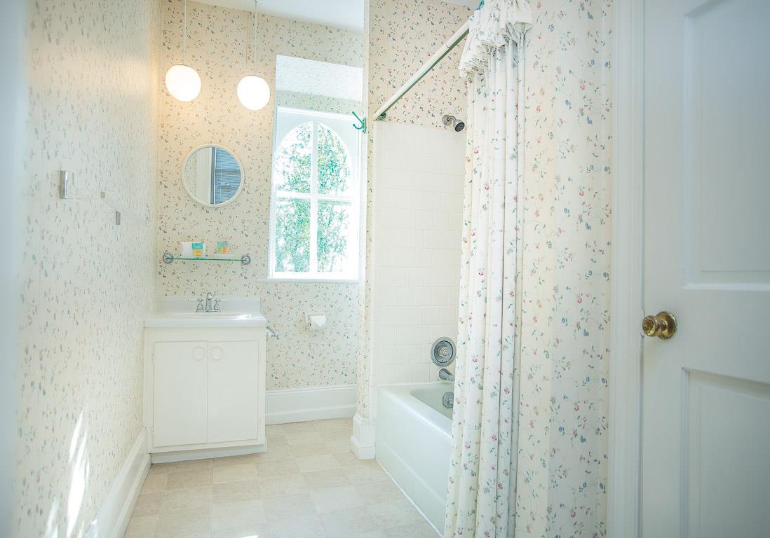The second bedroom uses this full bath at the end of the hall.