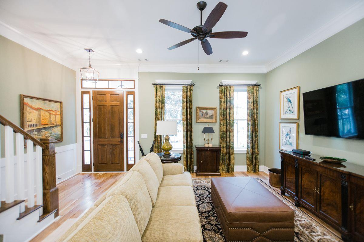 Boasting with natural light, the main living space over looks the Spanish Moss trees.