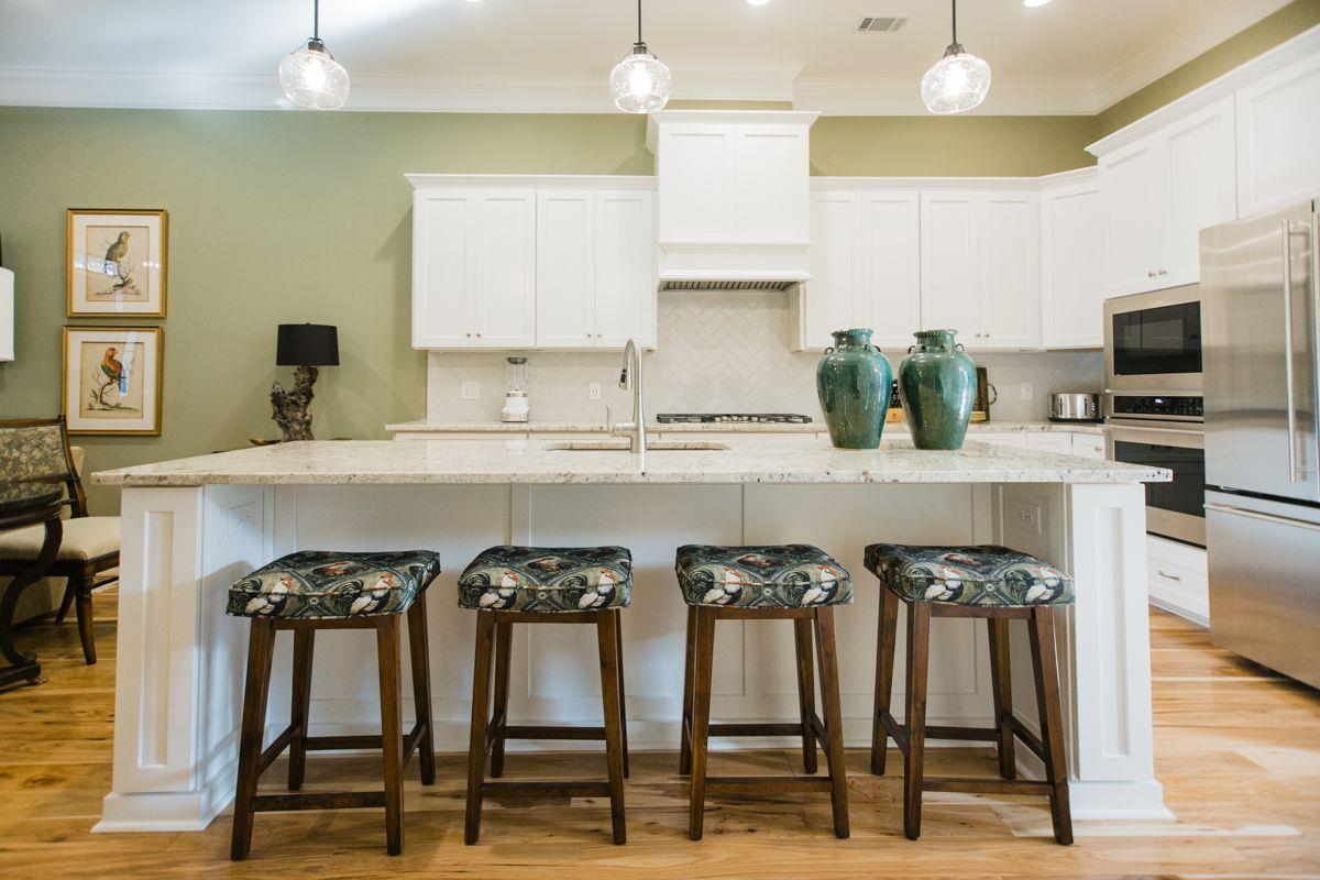 A large kitchen island with seating for four. A great place to serve your guests.
