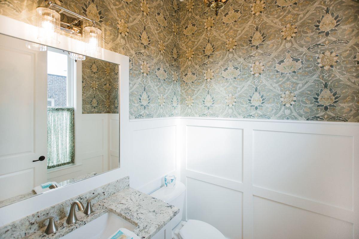 Just off of the dining room, a halfbathroom can be found.