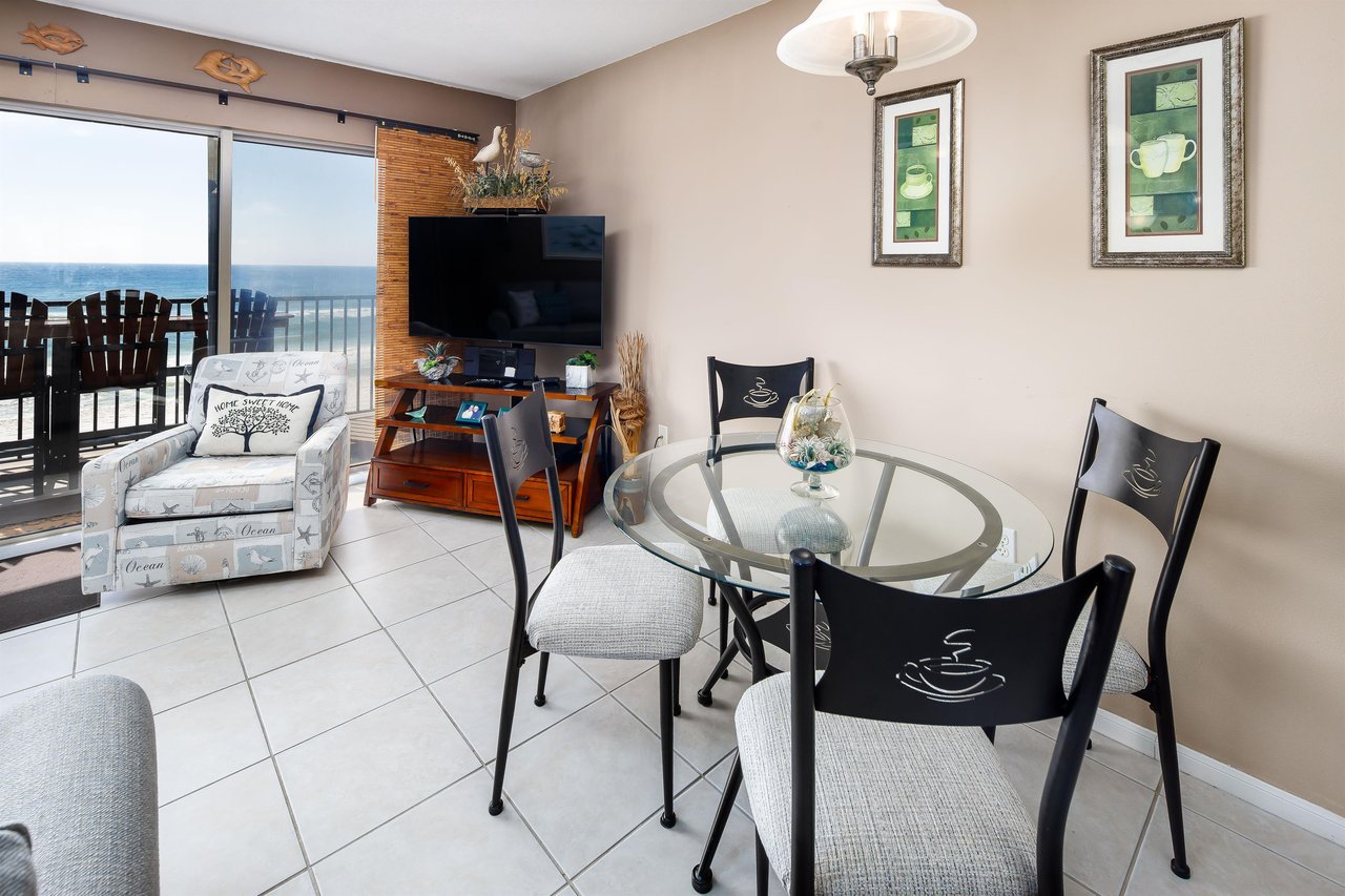 Seating for four. Enjoy the breathtaking view from this beachfront condo