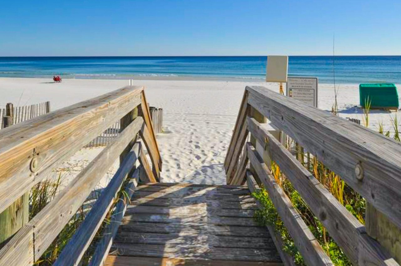 The complexs boardwalk leads directly to the beach.