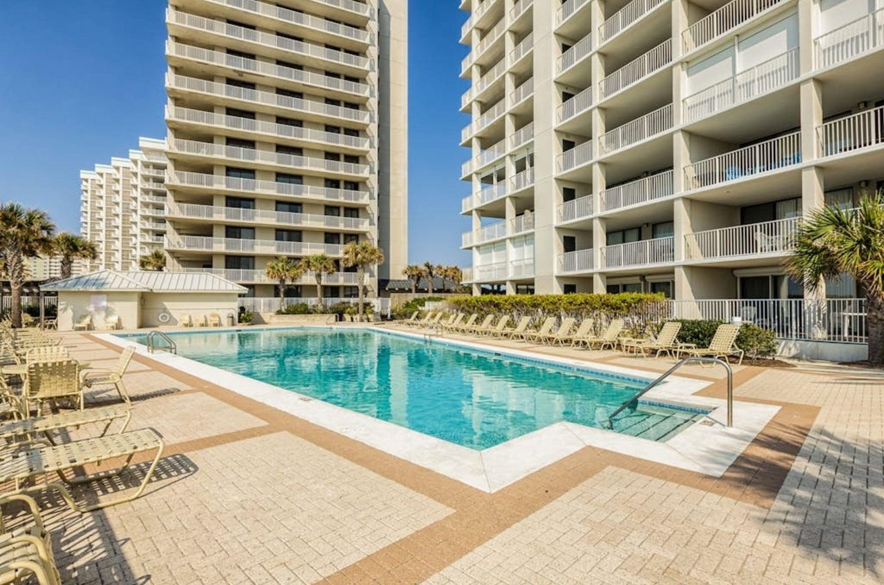 The outdoor swimming pool in front of Pelican Pointe in Orange Beach Alabama