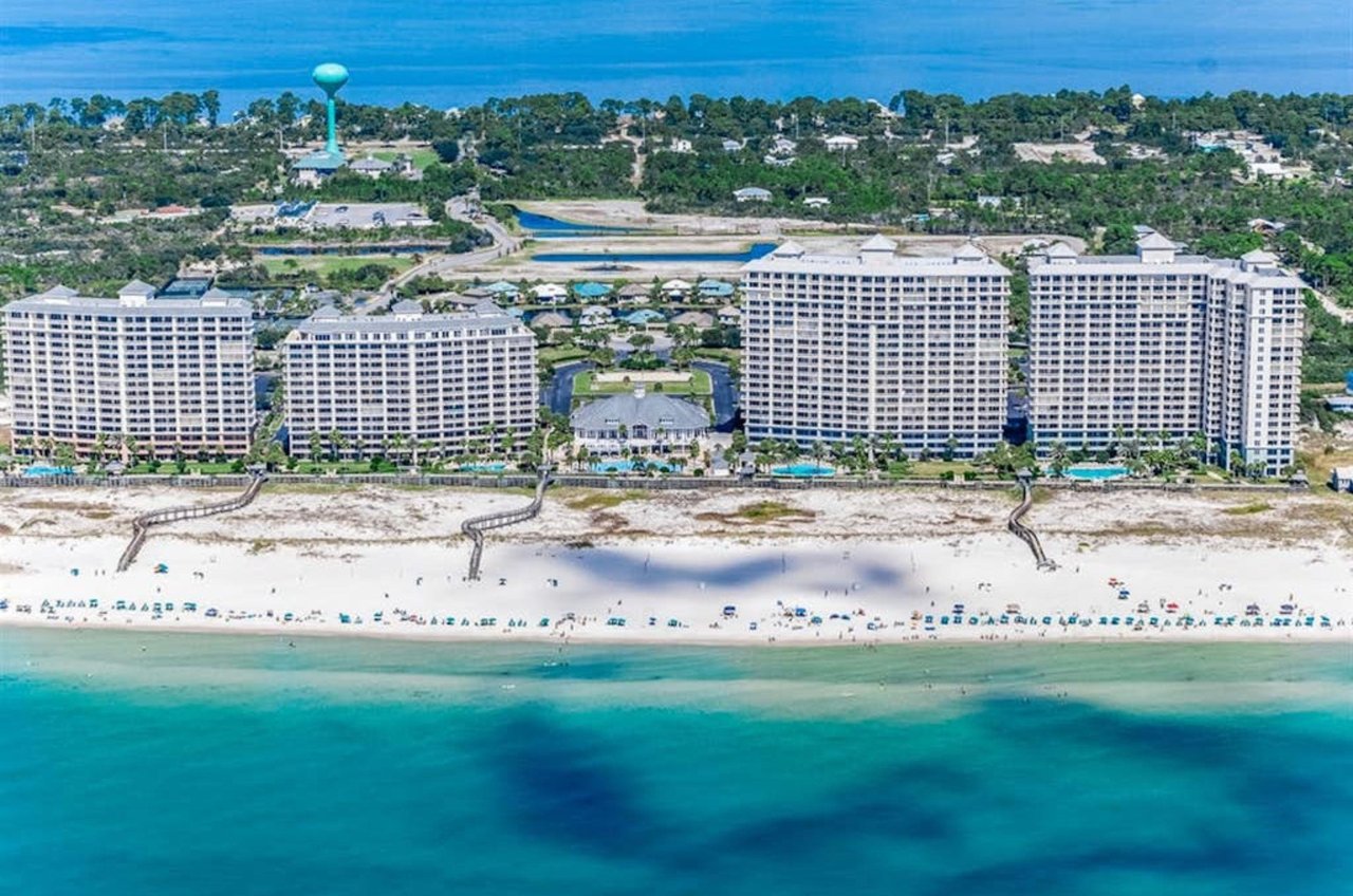The beachside exterior of Beach Club Resort in Gulf Shores Alabama