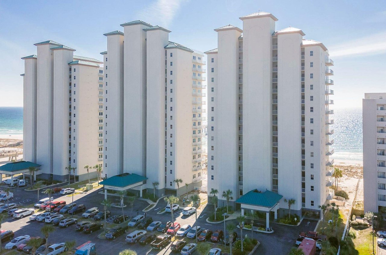 Aerial view of the streetside exterior of Beach Colony Resort
