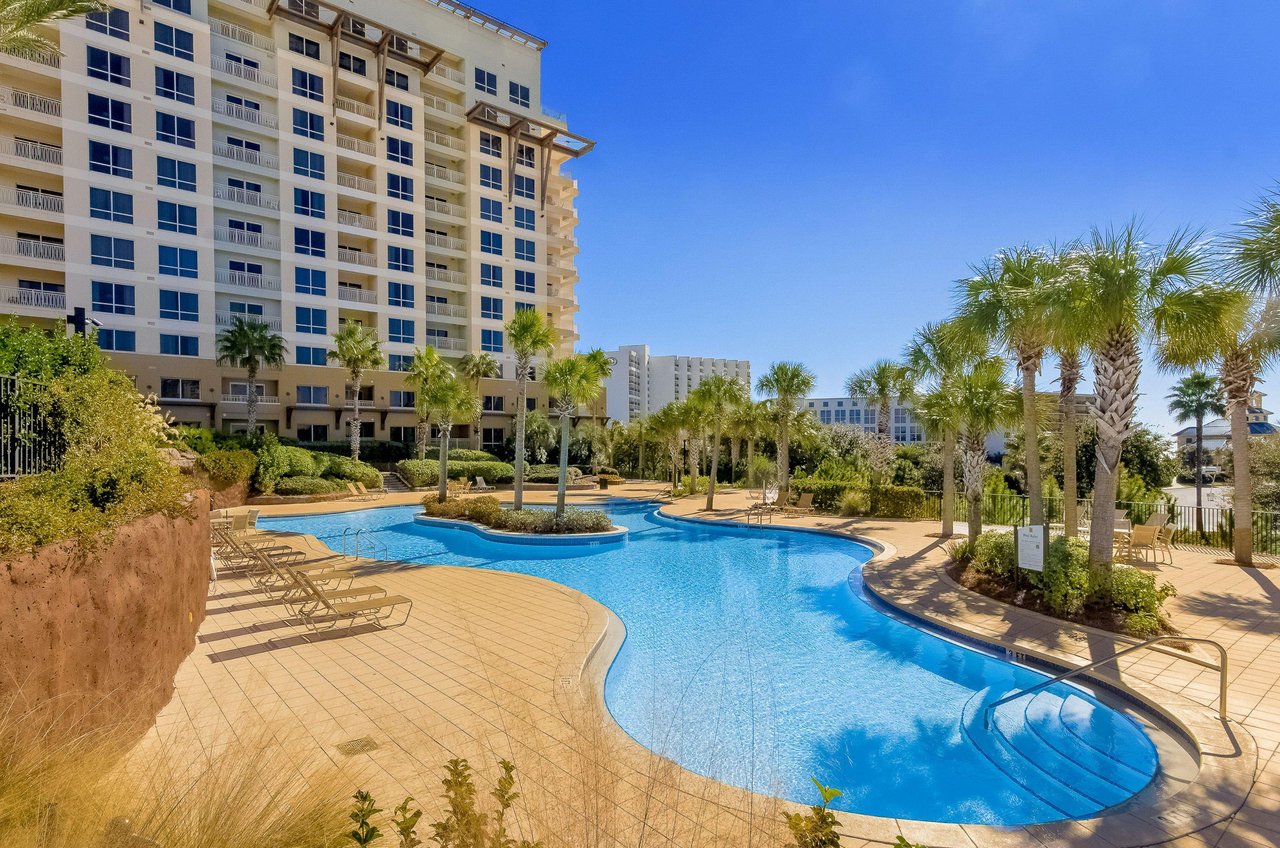 Luau Resorts shimmering aqua lagoon pool and spacious sundeck sit just next to one of the complexs two towers