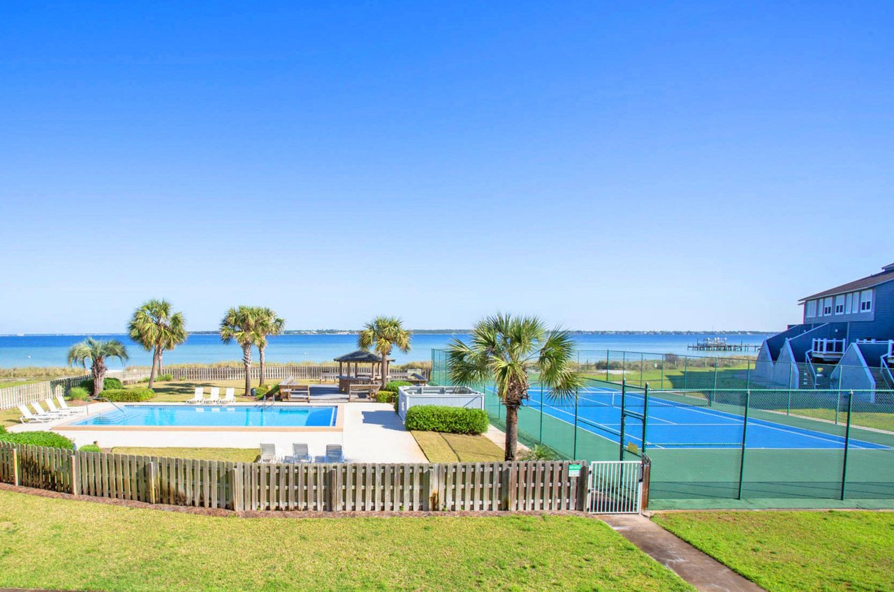 San DeLuna Townhomes feature a heated pool and tennis courts for all guests
