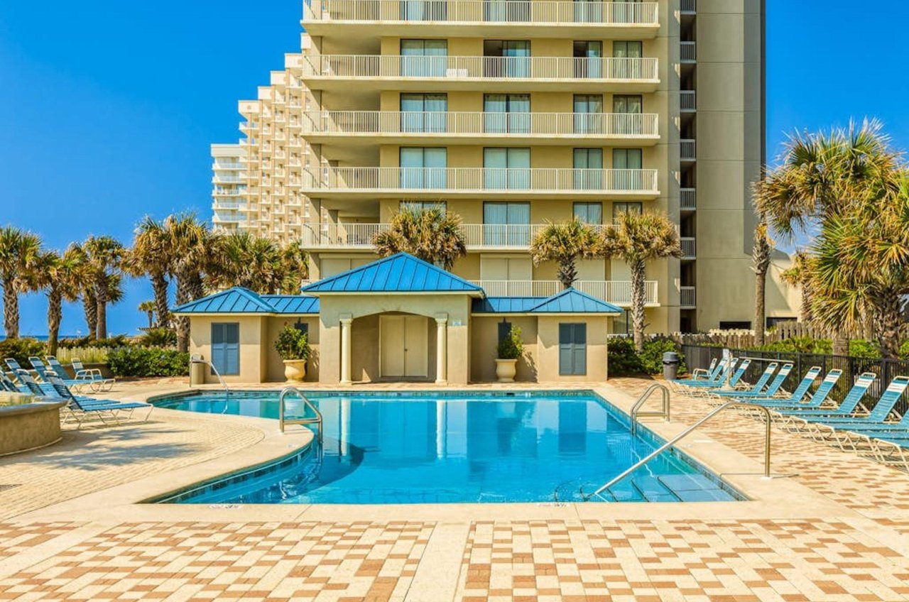 The luxurious beachside outdoor swimming pool at Bluewater Condos in Orange Beach Alabama