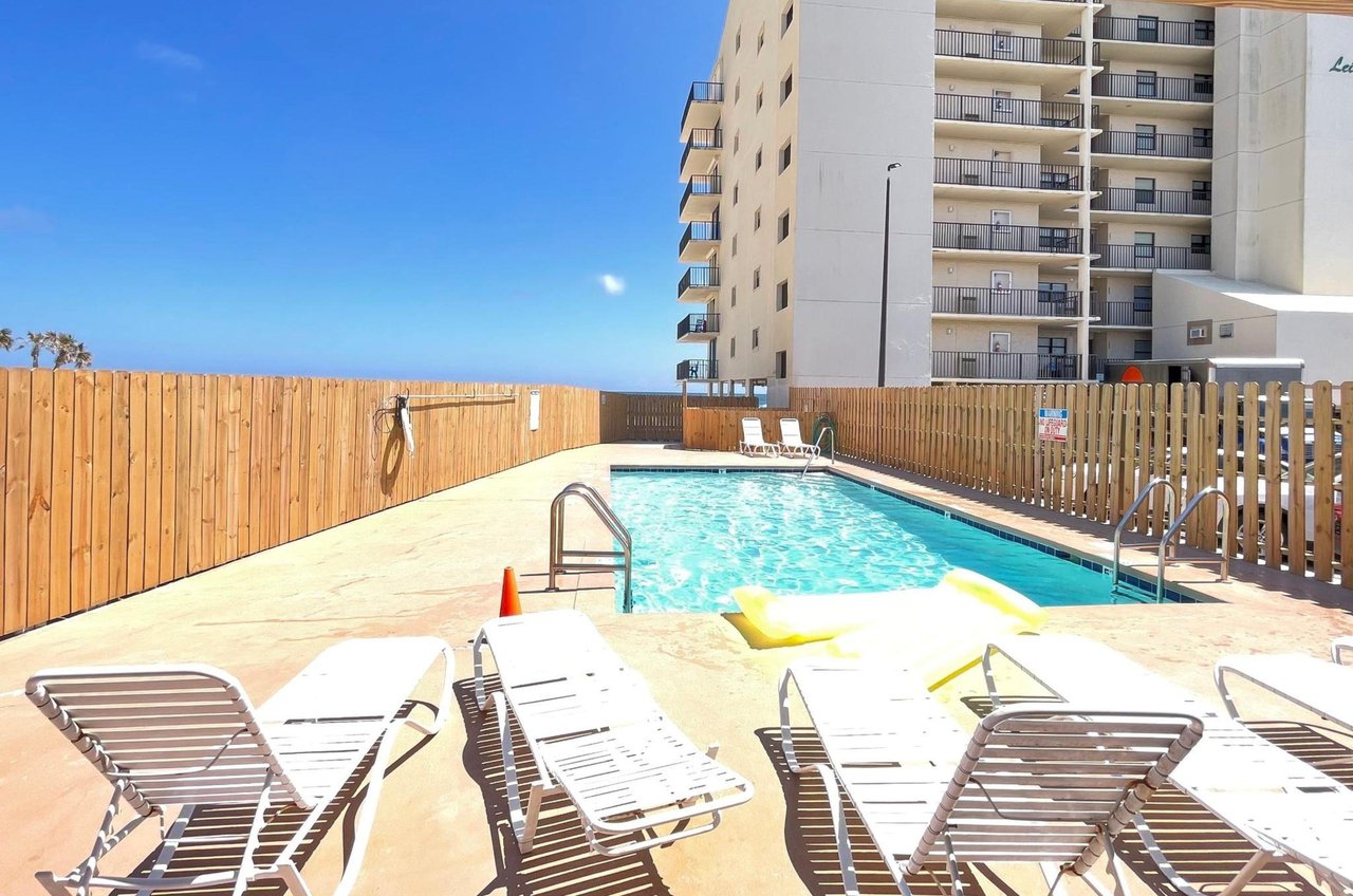 The outdoor swimming pool in front of Lei Lani in Orange Beach Alabama
