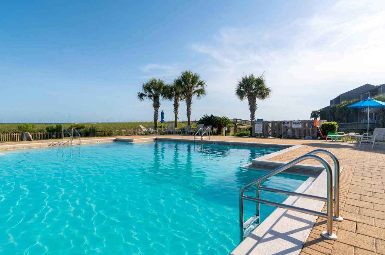 The community swimming pool next to the beach at Needle Rush Point