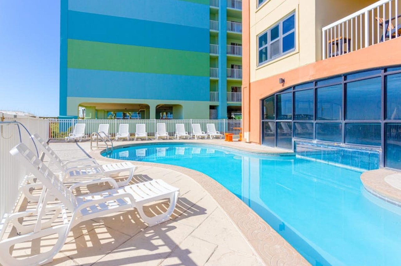 The outdoor section of the indooroutdoor swimming poolat Harbour Place in Orange Beach Alabama
