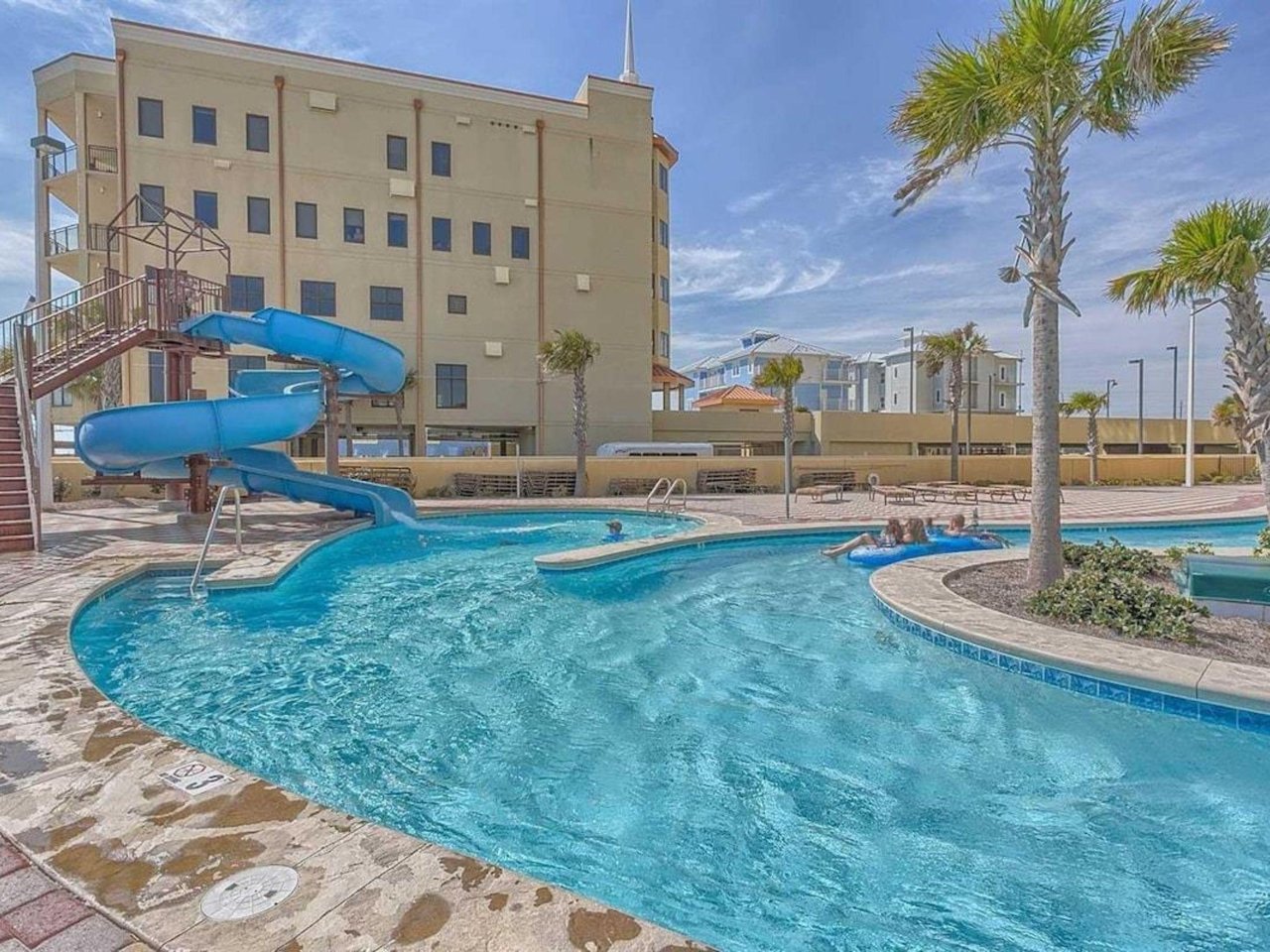 The exciting lazy river and water slide at The Oasis at Orange Beach