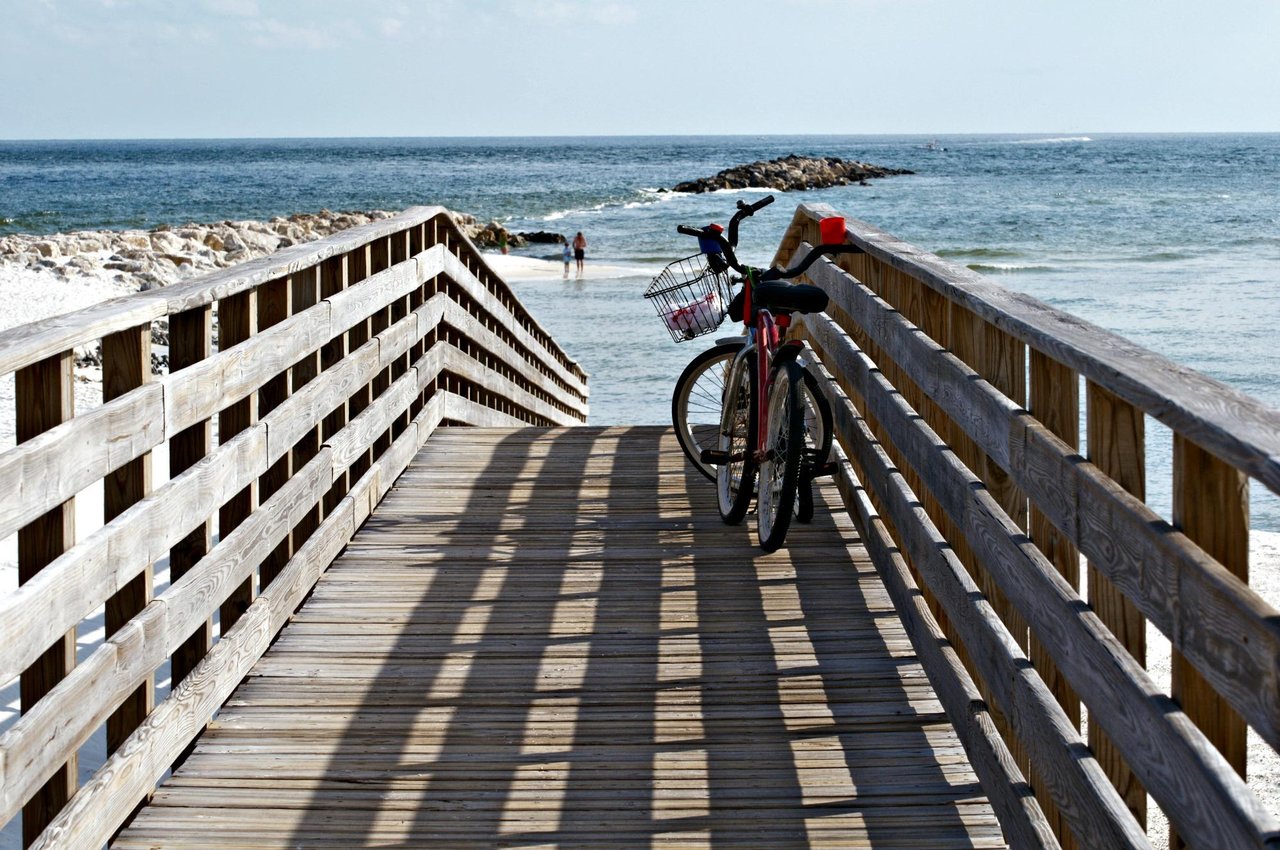 58406 Shutterstockfloridabeachboardwalkwithbikedarrylvest