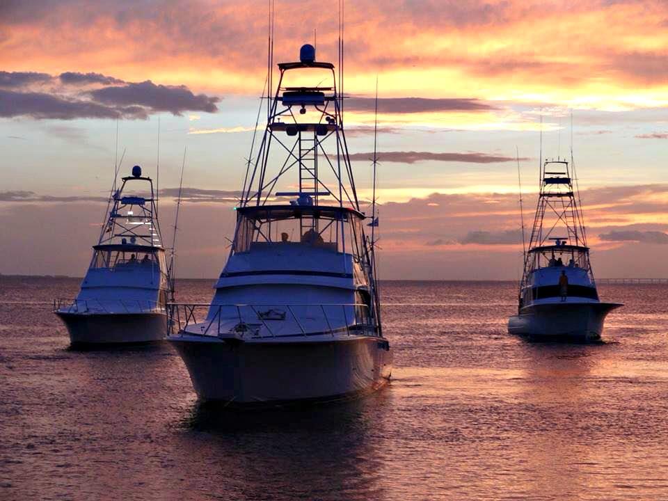59024 Destinfishingrodeo3boatsatsunsetphotocourtesyofbeonthecoast