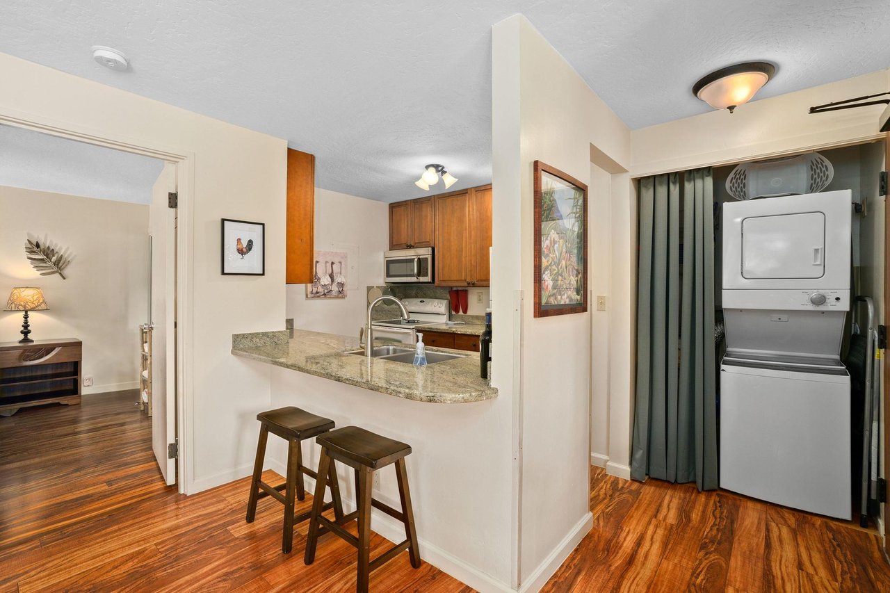 Kitchen with washer  dryer