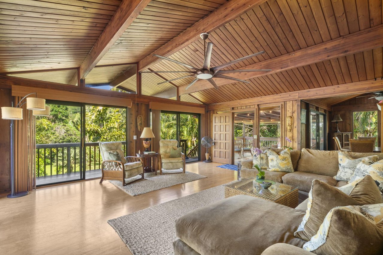 Living area is spacious with vaulted ceilings