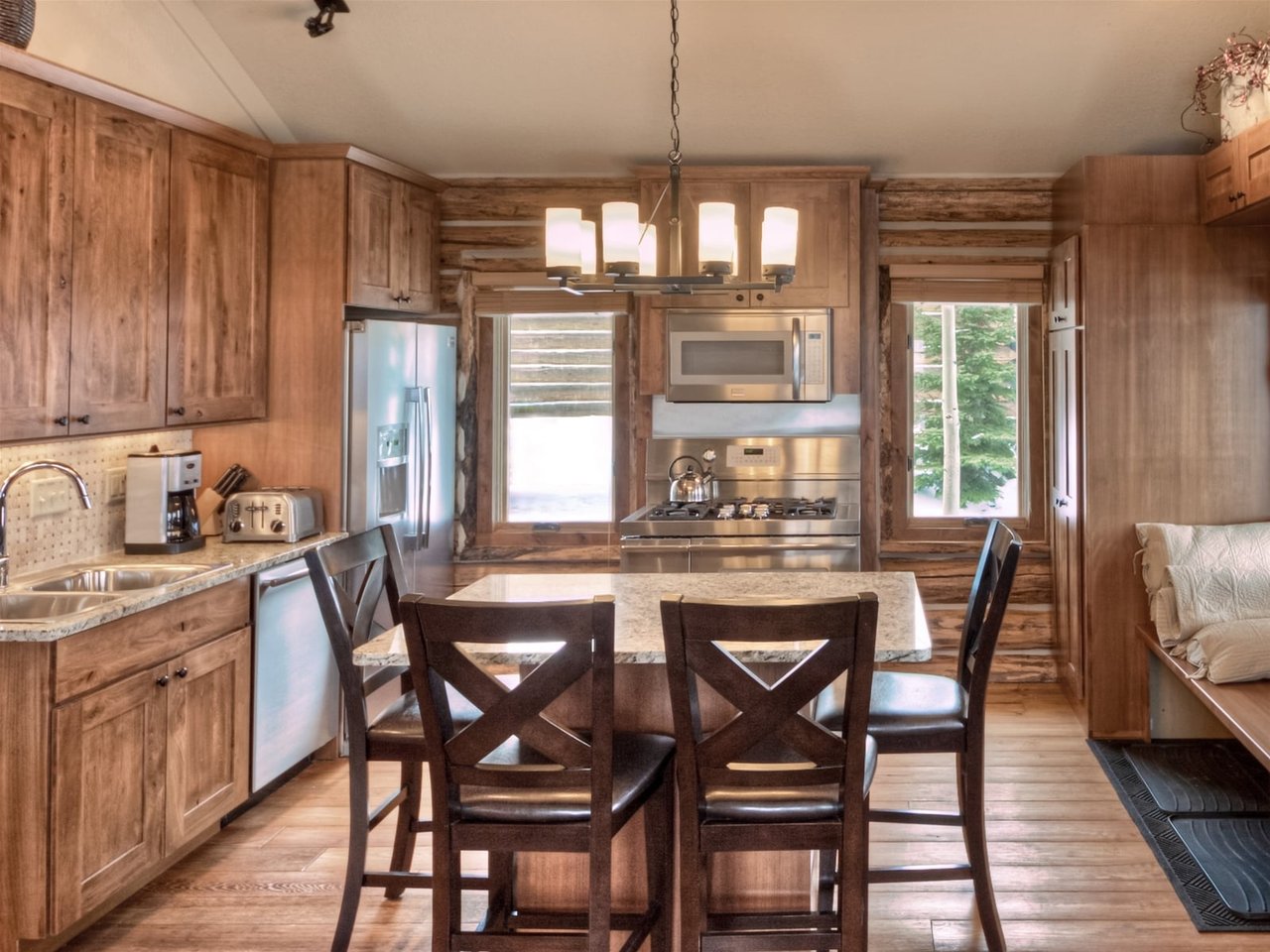 a kitchen with a dining table
