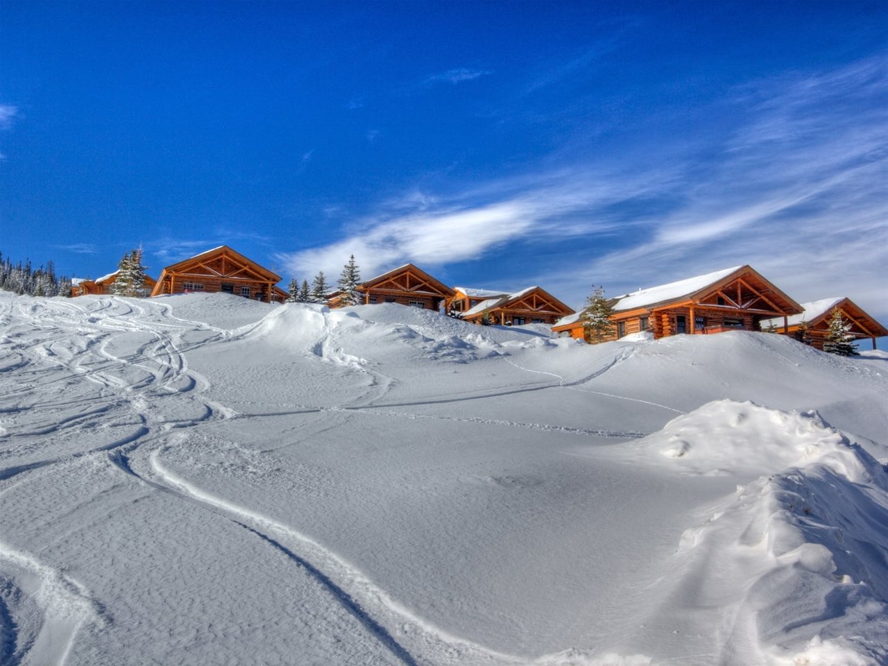 a snowy landscape with houses