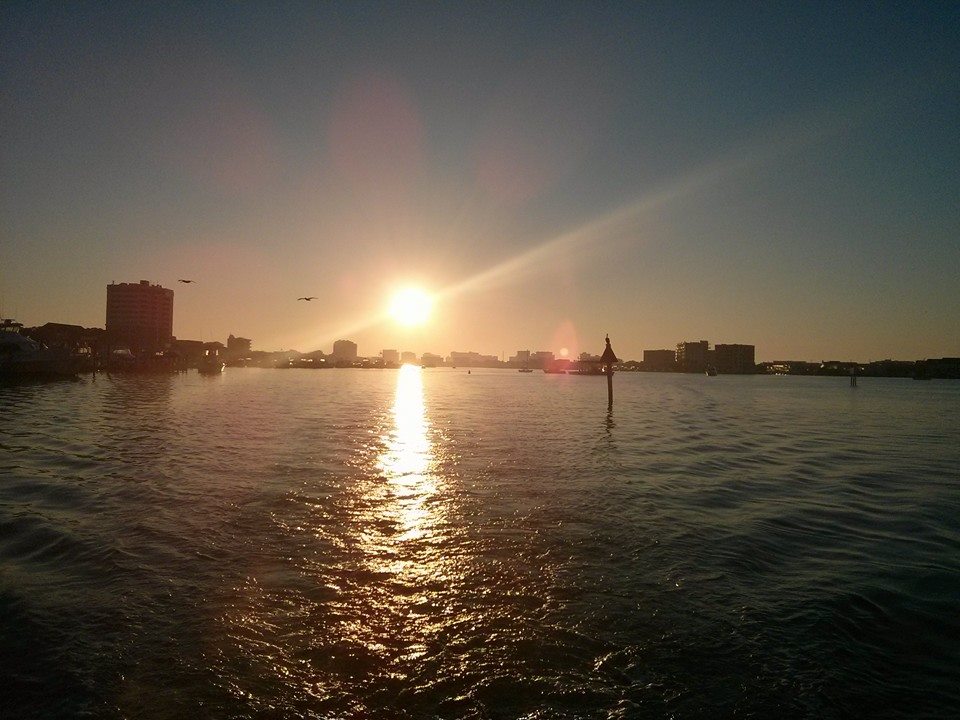 Destin Log heading out of Destin Harbor for fishing expedition